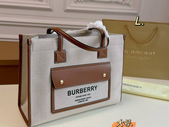 大号 无盒 Size:40 29 Burberry 巴宝莉新款帆布托特包 干干净净的帆布 搭配字体简洁 的logo 非常年轻街头 但又不失那股英伦复古腔调 男女