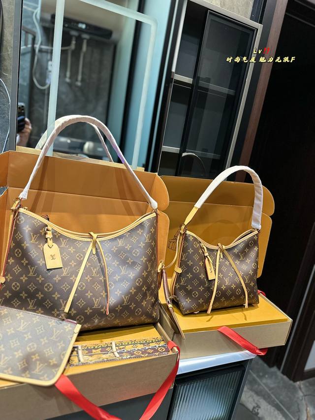 折叠飞机礼盒 Lv Carryall 新款购物袋 这款包真的太有味道了，浓浓的复古风情，Vintage 的精髓体现的淋漓尽致，灵感源自档案馆的复古细节，尤其值得