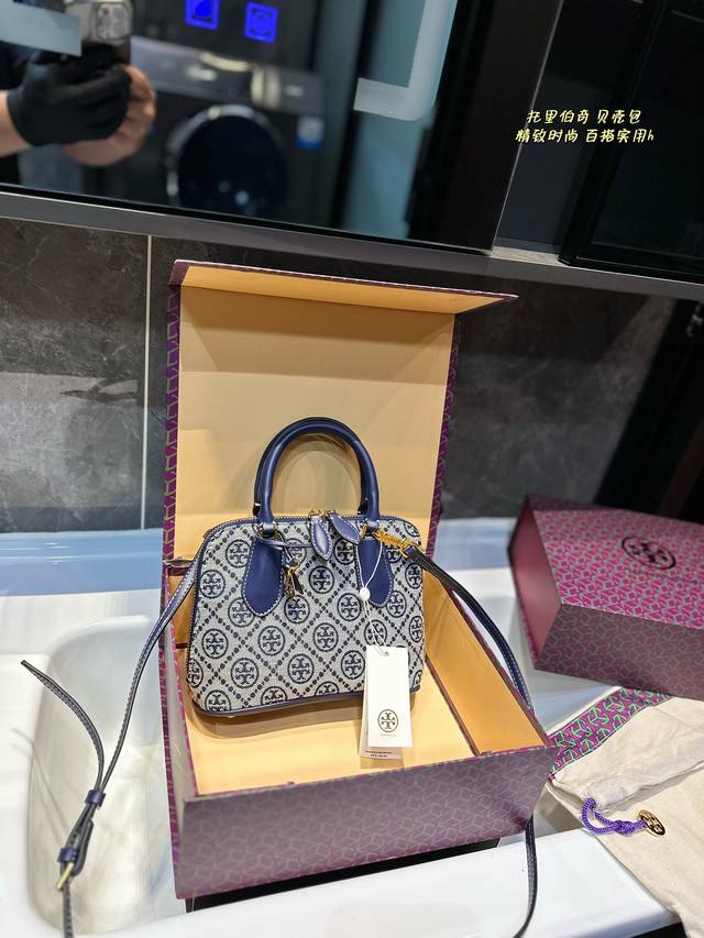 Tory Burch 老花贝壳包 老花手提包 Tb新款贝壳包，全新亮相，淑女版的医生包，90年代 复古风情，极简主义，酷似贝壳造型，所以也叫贝壳包。容储空间大，