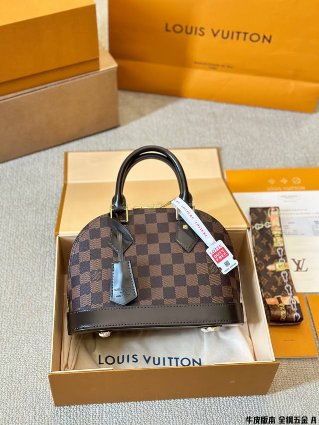 牛皮版本 全钢五金 Lv Lv Alma Bb牛皮贝壳包 原版高品质 包包这款retiro 手袋以标志性的老花面料制成 经典永恒。优雅低调的外形设计和宽敞的包身