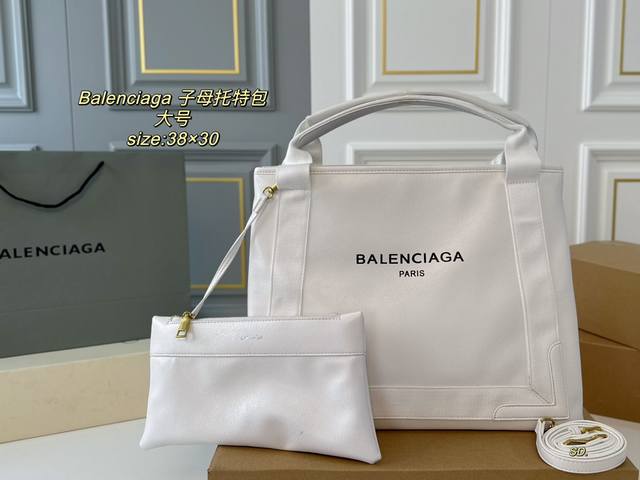 大号 无盒 size：38×30 BALENCIAGA 巴黎世家新款子母托特包 皮质柔软，简约大方，手感超赞 简约的字母，容量足日常～ 随性中带着一点收敛感，超