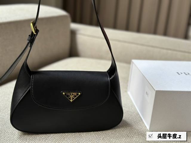 Prada 全皮 新品首发t+2024早春新品小号全皮单肩包 全新设计椭圆形轮廓展现流畅的美学构造采用别致高贵小牛皮优雅简洁的包身设计正面经典logo金色标识配