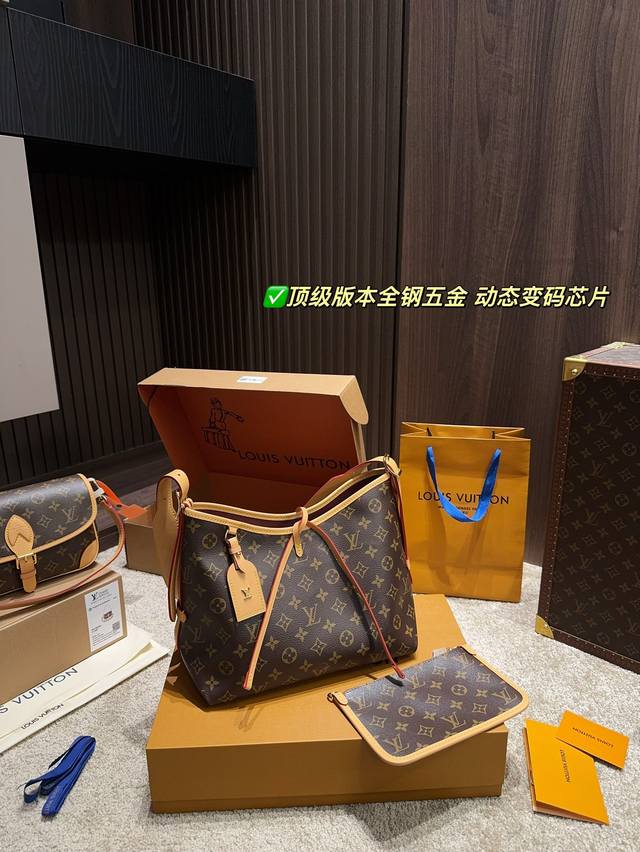 顶级版本全钢五金 动态变码芯片 全套包装尺寸28.20 Lv Carryall 它的外观设计简约大方，却又不失lv的经典优雅。流畅的线条，搭配标志性的品牌元素，