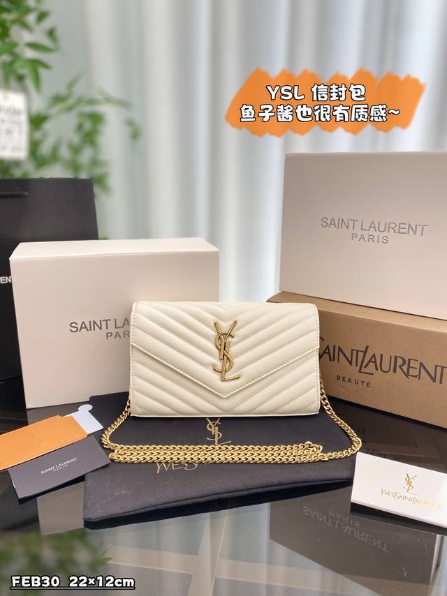 配全套礼盒 Size：22×12 圣罗兰 Ysl 信封包 鱼子酱金扣 按扣手拿斜挎单肩包 Ysl 经典款 信封包 黑金配色鱼子酱皮质感好耐磨耐用在woc包型中算