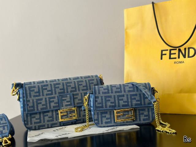 零钱包 Fendi Baguette法棍包中号第一眼就觉得砸中了我。加上中号有一根较长的肩带，非常实用。中号的装两个手机，钱包，钥匙，墨镜，口红，粉饼都毫无压力