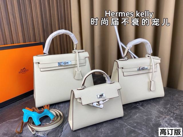 配全套包装 高订版 爱马仕hermes Kelly 十字纹牛皮 材质进口 喜欢这个款式的美妞们必须拿下啦 不论怎么看都是最特别不腻的 配有一根长肩带 包包特别有